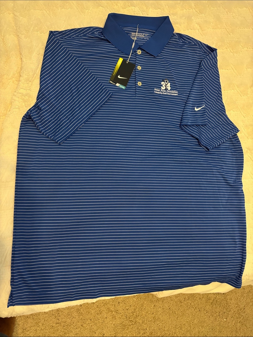 Nike Men’s Royal Blue & White Striped Polo with Nolan Ryan Logo